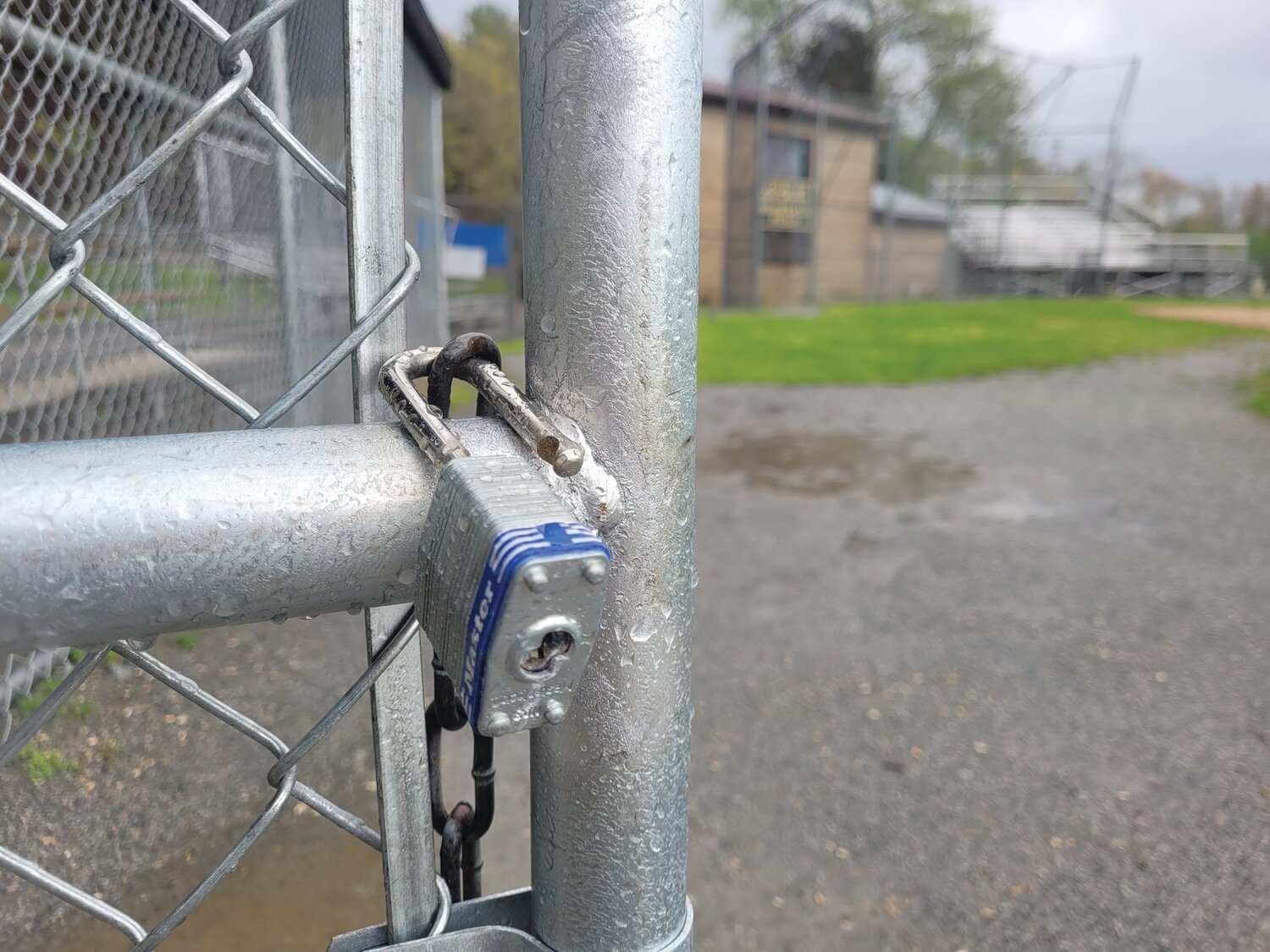 OPEN FOR PLAY? Johnston has been locking most of the town’s ballfields. One town councilman would like to see that policy change. The town’s director of buildings and grounds, however, says the locks keep out pooping dogs and their irresponsible owners.